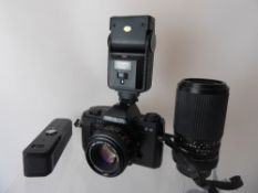A Minolta X-9 Camera, (tested), 50/1.7 MD, 70-210 MD, autowinder (not tested), flashgun (not