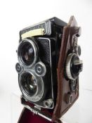 Rolleiflex 3.5F Camera, (edge balsam fault), meter working, caps and together with camera case.