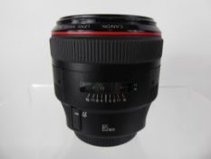 Canon EOS 85/1.2 Lens nr 55775 (nof) + Lens Hood.