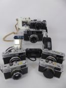 2 x Olympus 35 SP Cameras (1 x af), Auto-Eye, OM10 (dust in lens), 2 x 35RC (af).