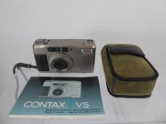 Contax TVS Camera, (nof apart from slight LCD frame counter leakage) filter, lens cap, case.