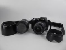 Olympus E-500 Digital SLR Camera, with 14-45 and 14-150 zoom lenses, with hoods, charger and Lowepro