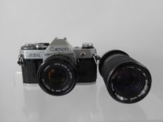 Canon AE-1 Camera, 50/1.8 (nof, no Canon mirror squeak) 70-150 Vivitar lens (scratch on front).