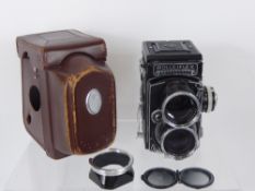 Tele-Rolleiflex Camera, case, lens hood, edge balsam faults, (tested).