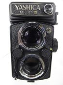 Yashica 124G Camera, meter responsive, shutter ok, lens clean.
