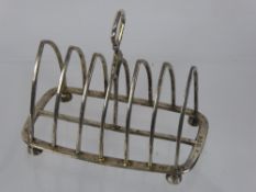 A Silver Toast Rack, London hallmark, dated 1894, approx 180 gms together with a silver cased Kitney