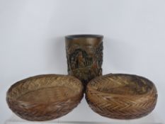 A Bamboo Style Brush Pot, approx 14 cms high together with two woven rice baskets (3)