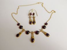 A Lady's Liberty Style 1920's 15 ct Yellow Gold Cabachon Garnet and Seed Pearl Necklace and