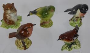 Quantity of English Porcelain Garden Bird Figurines, including Beswick green bird, red robin,