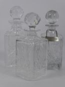 A Trio of Good Quality Decanters and Stoppers, two being Stuart Crystal, the third cut glass. (3)