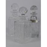 A Trio of Good Quality Decanters and Stoppers, two being Stuart Crystal, the third cut glass. (3)