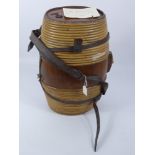 A Vintage Agricultural Workers Oak and Cane Barrel Harness, the cylindrical barrel tapers with a