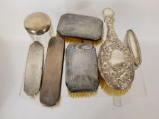 An Art Deco Dressing Table Set, including two hair brushes, two clothes brushes and a lady's