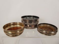 Two Silver Wine Coasters, Birmingham hallmark, dated 1972 mm A.T.C the other London hallmark,