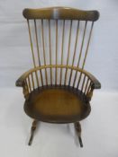 An Oak Ercol Grandmother Fireside Rocking Chair.