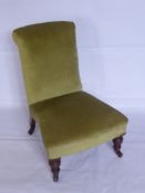 A Victorian Bedroom Chair, on turned legs, with celadon green upholstery.