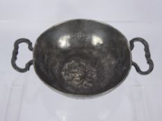 An Early Pewter Twin-Handled Porriger dd 1736, decorated with insects, flowers, snail and