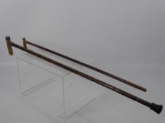 Two Antique Walking Sticks, one miniature with horn handle approx 72 cms long. (2)