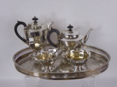 A Sheffield Plate Tea Set, comprising teapot, coffee pot, sugar bowl, milk jug, on galleried tray,