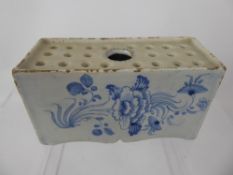 A Late 18th/Early 19th Century Delft Flower Brick Vase, hand painted with peony, approx 7 x 16 x 9