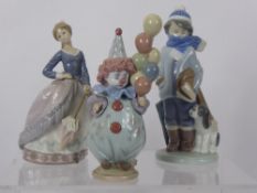 Seven Lladro Figurines, including 'Winter', 'Girl and Umbrella', 'Sleepy' and 'Accordion player', '