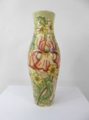A Moorcroft Vase 'Flag Iris' design, approx 26 cms, factory marks to base.