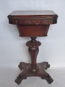 A Victorian Rosewood and Mahogany Sewing Box, the box having tulip form column base with scroll