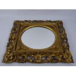 A 19th Century Gilt Wood Mirror, in the Italian style, approx 49 x 44 cms