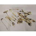 Quantity of Silver Accoutrements, three butter knives, five mother of pearl and silver lemon
