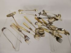 Quantity of Silver Accoutrements, three butter knives, five mother of pearl and silver lemon