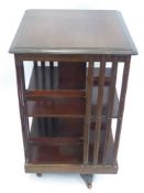 An Edwardian Mahogany Revolving Library Stand, on casters, approx 48 x 48 x 83 cms.