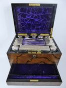 A Lady's Victorian Burr Walnut Vanity Case, purple ruched velvet interior fitted with three cut