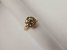 A Lady's Antique 18 ct (tested) Yellow Gold and Diamond Cluster Ring, size Q, 1 ct - 1.10 ct of