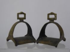 A Pair of Antique Brass Stirrups, approx 16 cms high.