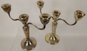 A Pair of Sterling Two Branch Candle Sticks, Birmingham hallmark, dated 1974, mm William Adams,