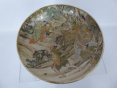 A Japanese Satsuma Bowl, depicting bandits accosting travellers, approx 24 x 11 cms (af) together