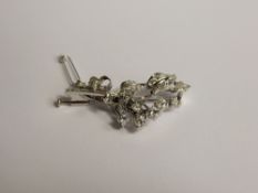 A Lady's 1920's Platinum (tested) and Diamond Floral Brooch, floral spray design, presented in an