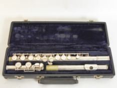 An American Flute, stamped 'Deg Music Co. Inc., USA,' Claudel model, in a fitted case.