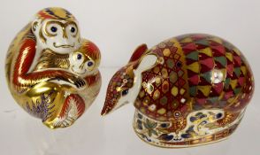 Royal Crown Derby Paperweights, 'Armidillo' and 'Chinese Monkey Group', both gold stoppers, complete