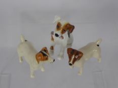 A Pair of Beswick Dogs, and one Royal Doulton porcelain dog seated. (3)