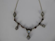 A Moonstone and Garnet Silver Necklace.