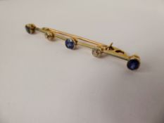 A Lady's Antique 18 ct Yellow Gold and Platinum (tested) Diamond and Sapphire Bar Brooch. the brooch