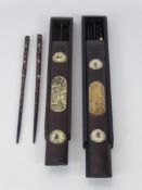 Two Vintage Japanese Bone Inlaid Chopstick Cases, the cases depicting a lady in a garden and