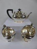 A Sterling Silver Tea Trio, Sheffield hallmark, dated 1934, mm Atkin Bros comprising tea pot, twin