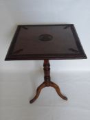 An Oak Tilt Top Table Inscribed Duke of Connaught, the table having carved with floral border,