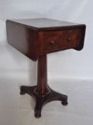 An Antique Mahogany Drop Leaf Occasional Table, having single dummy and working drawers, round