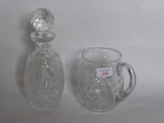 A Waterford Crystal Decanter, together with a cut glass decanter and water jug. (3)