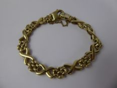 A Lady's 9 ct Yellow Gold Fancy Gate Link Bracelet, approx 12 gms