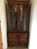 A Reproduction Mahogany Astral Glazed-Fronted Corner Cabinet, the cabinet having a pull-out