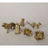 A Quantity of Sterling Silver Miniature Animals, including seated cat, playful cat, dog,
